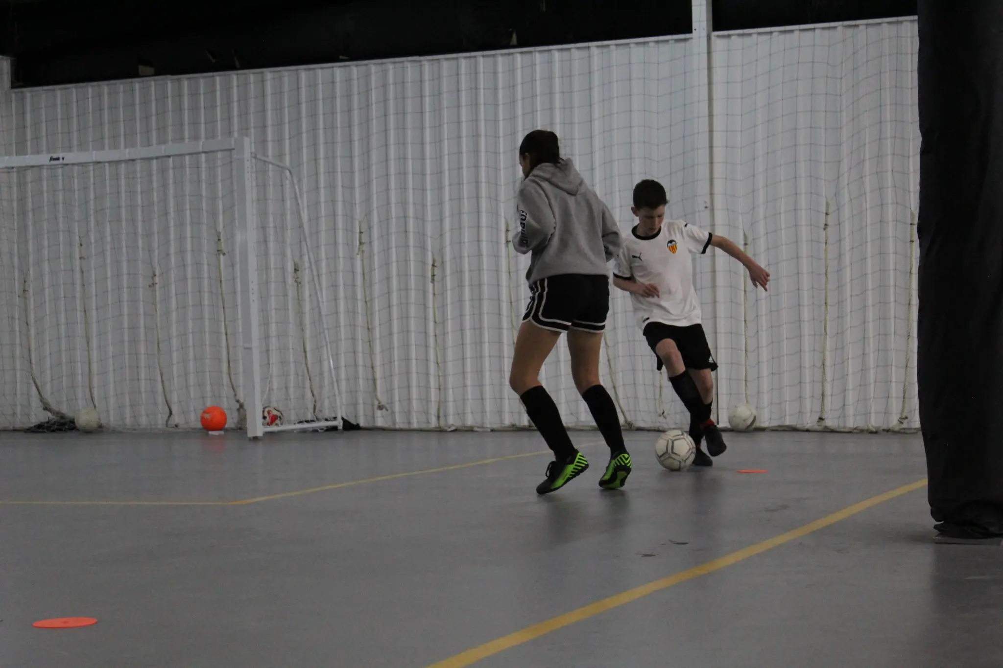 Athletes training goalkeeping and reaction skills at Jacksonville Futsal Academy